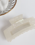The Shimmer Shell Claw Clip